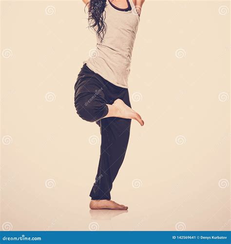 Barefoot yoga woman stock image. Image of healthy, legs - 142569641