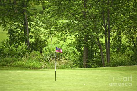 American Flag on Golf Green Photograph by Catherine Sherman - Pixels