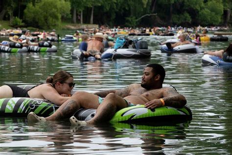 Photos: Tubing along Guadalupe River on hot July day lures in Texans