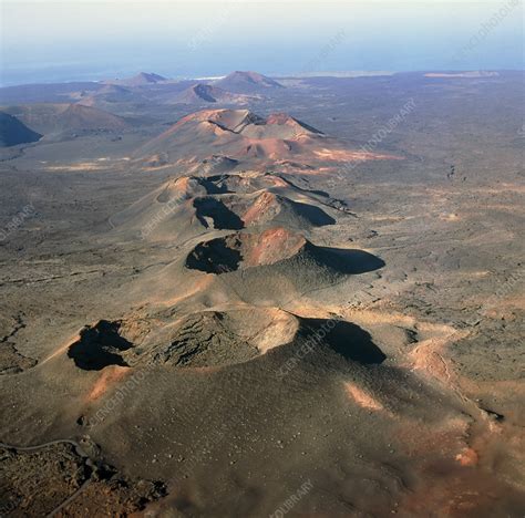 Craters along a fissure zone on Lanzarote - Stock Image - E380/0373 ...