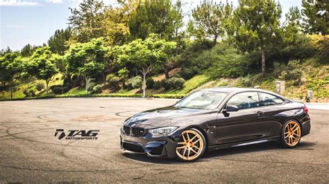 BMW M4 Coupe on Matte Black HRE and Gold MORR Wheels | Carscoops