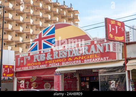 Benidorm, Spain, street view of british bars and signage in the new ...