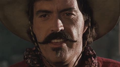 In Tombstone (1993) Powers Boothe plays Curly Bill Brocius, a bumbling ...