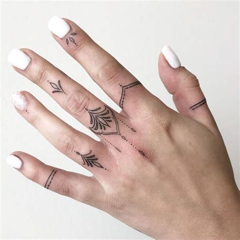 40 Tiny Finger Tattoos That Define Perfection - TattooBlend