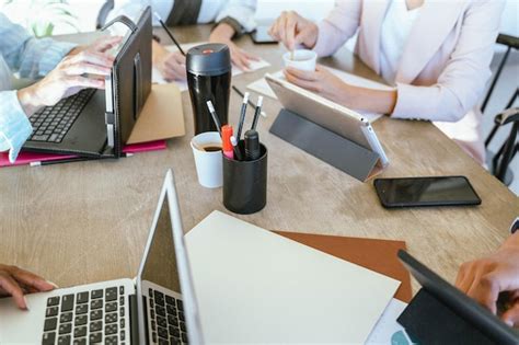 Premium Photo | Close up view of a table during a business meeting ...