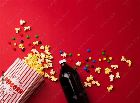 Popcorn and Soda Concession Background with Chocolate Candies Stock Photo | Adobe Stock