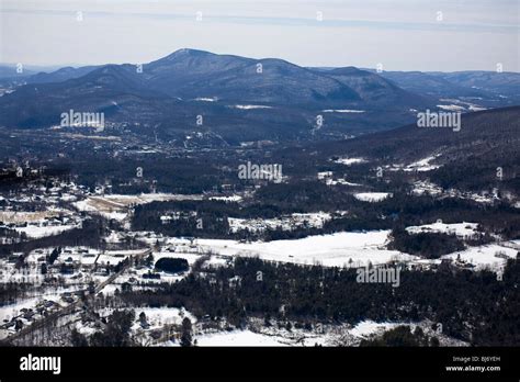 North Adams Massachusetts aerial view in late winter. Mount Greylock is in the background Stock ...