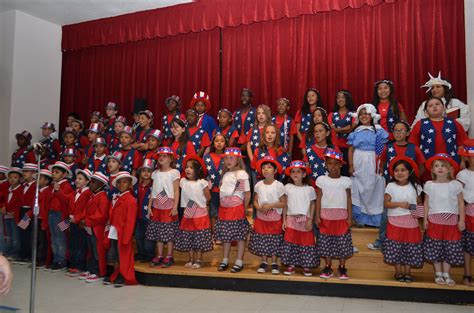 The kids of Monte Vista Elementary School gather on stage to sign and show their Patriotism in ...