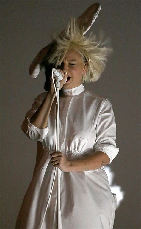 Sia's Face Accidentally Exposed on Stage Thanks to a Gust of Wind | E! News