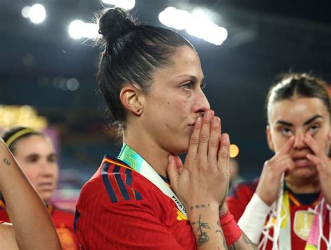 Spain star Jenni Hermoso reacts after FA president Luis Rubiales kisses her on lips