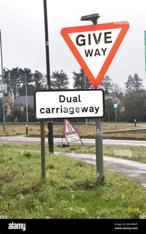 Road sign warning Dual carriageway ahead Stock Photo - Alamy