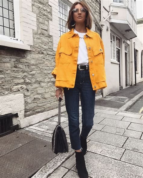 A yellow denim jacket is definitely one way to brighten up a dull Sunday | Yellow jacket outfit ...