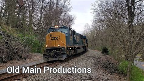 CSX SD70MAC rebuild leads M331 with stunning horn - YouTube