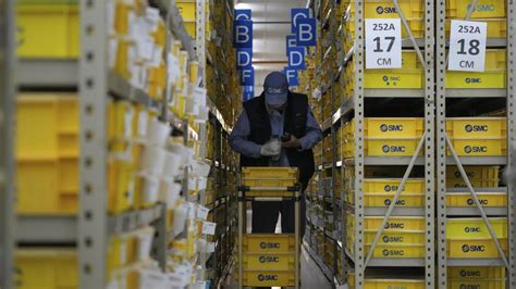 China's manufacturing accelerates as economy revives | AP News