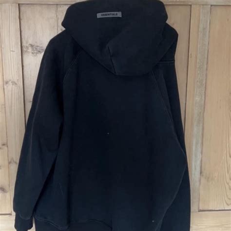 Black Essentials Hoodie worn quite a bit but very... - Depop