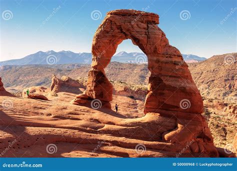 Photographer at Delicate Arch, Arches National Park, Utah Stock Photo ...