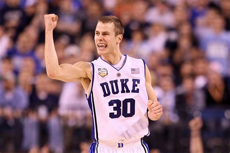 Jon Scheyer of the Duke Blue Devils reacts in the second half while...