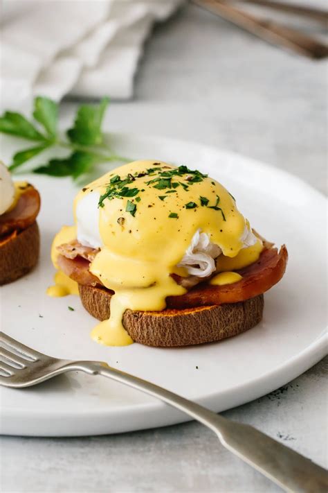 Healthy eggs Benedict is a creative breakfast and brunch recipe made up of four delicious layers ...