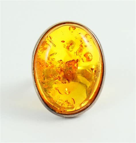 AMBER RING | ESTATE & CONSIGNMENT JEWELLERY, WATCHES | Online Auction | Gardner Galleries