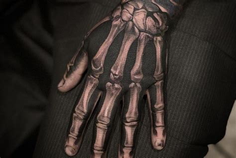 100 Fantastic Skeleton Hand Tattoos (Cool & Unique) - The Trend Scout