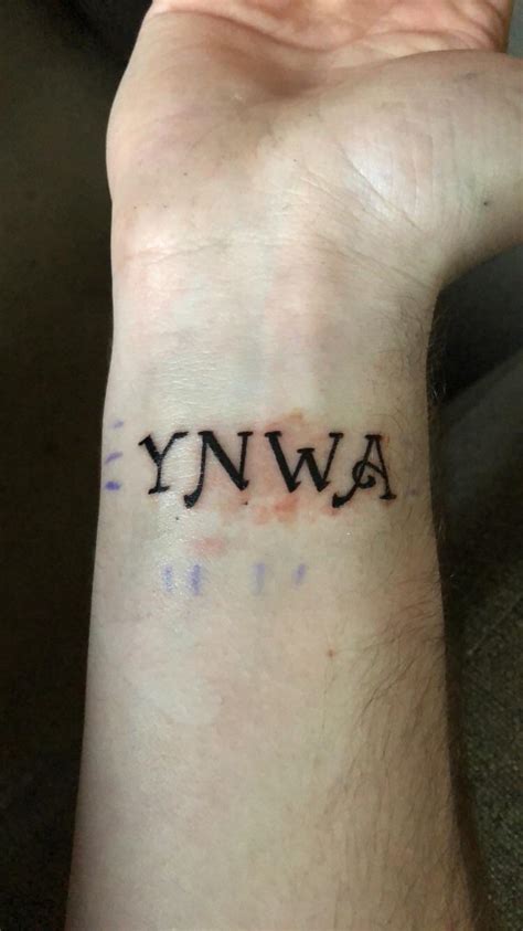 Ynwa Wrist Tattoos