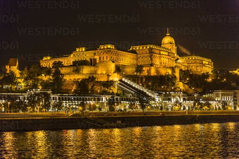 Hungary, Budapest, illuminated Buda Castle by night stock photo