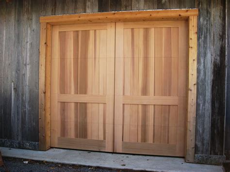 Country barn door, 10 feet wide and nine feet high in a clear western ...