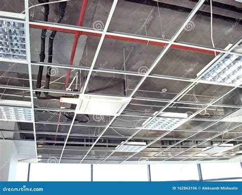 False Ceiling Installation stock photo. Image of engineering - 162863106