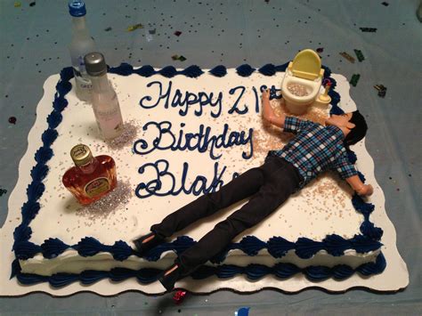 a birthday cake with a doll laying on the table next to bottles and confetti