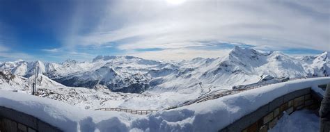 panorama of a mountain range covered in a thick layer of snow in the austrian alps, snowy alpine ...