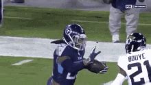 Derrick Henry Stiff Arm GIF - DerrickHenry StiffArm Nfl - Discover & Share GIFs