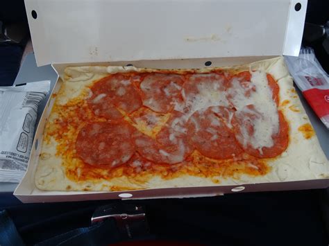 This is what you get when you order pizza on an airplane. : r/pics