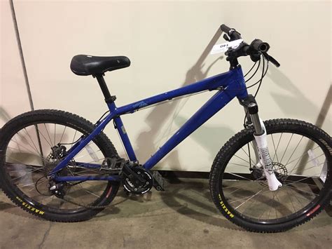 BLUE KONA SHRED 24 SPEED FRONT SUSPENSION MOUNTAIN BIKE WITH FULL DISC BRAKES