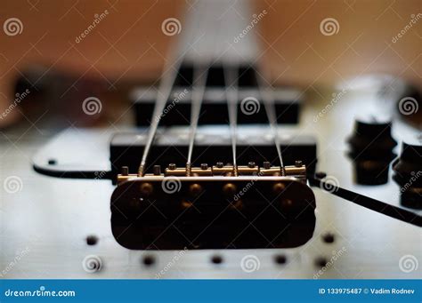 Closeup Shot of a Bass Guitar Bridge - Fender Jazz Bass Style Bridge ...