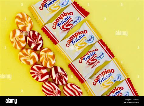 Campino boiled sweets, fruit and yogurt flavours, yellow background Stock Photo - Alamy