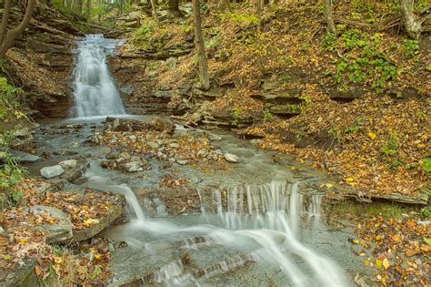 Autumn Waterfall - A quiet waterfall in the woods reminds us how beautiful and relaxing nature ...