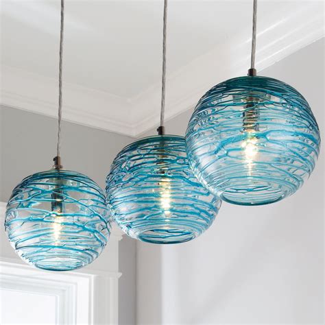 Swirling Glass Globe Mini Pendant Light aqua | Coastal pendant lighting, Living room wood, Beach ...