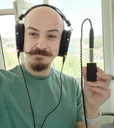 You folks weren't kidding, this thing is SMOL (Qudelix 5K feat. LCD-2C) : r/headphones