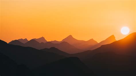 3840x2160 Resolution Orange Sunrise at Hills 4K Wallpaper - Wallpapers Den