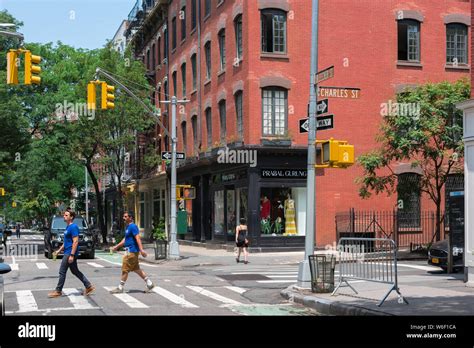 Bleeker Street NYC, view in summer of people crossing Bleeker Street in ...