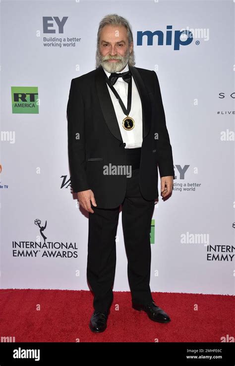 Haluk Bilginer arrives at the 47th International Emmy Awards gala at the Hilton Hotel on Monday ...