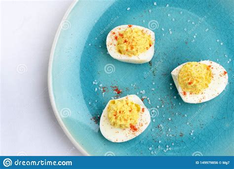 Top View Deviled Eggs with Paprika and Salt Stock Photo - Image of ...