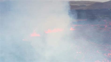 Volcano vent eruption with ejected lava river flowing 4K Stock Footage ...