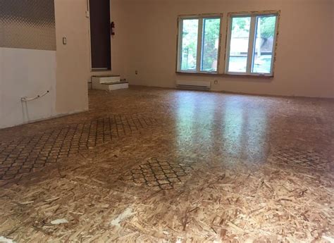 Insulated OSB subfloor, sealed and polished! Sanded, sealed with 1:1 PVA glue and water then ...