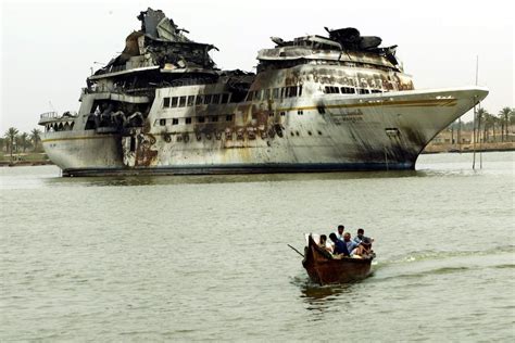 Saddam Hussein's rusting yacht al-Mansur now serves as a picnic spot for Iraqi fishermen - ABC News