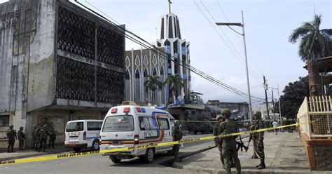 Philippines bombing: At least 20 dead in attack on Jolo cathedral