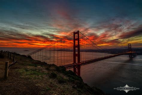 Yesterday's fiery sunrise over the Golden Gate Bridge and San Francisco ...