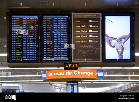 Airport departure display / monitor / television / tv timetable display notice board in the ...