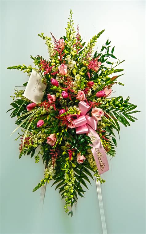 Standing Easel spray make with snapdragons, roses, tulips, and lilies. | Funeral flower ...