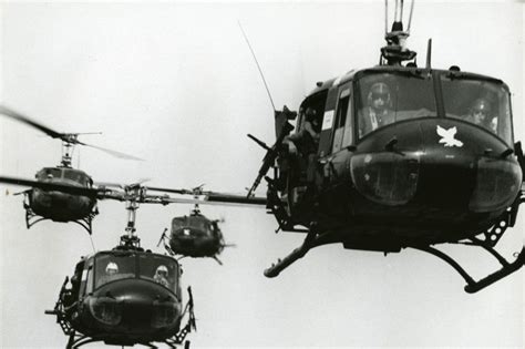 Bell UH-1 Huey Helicopter in Formation Flight in Vietnam | Helicopters ...